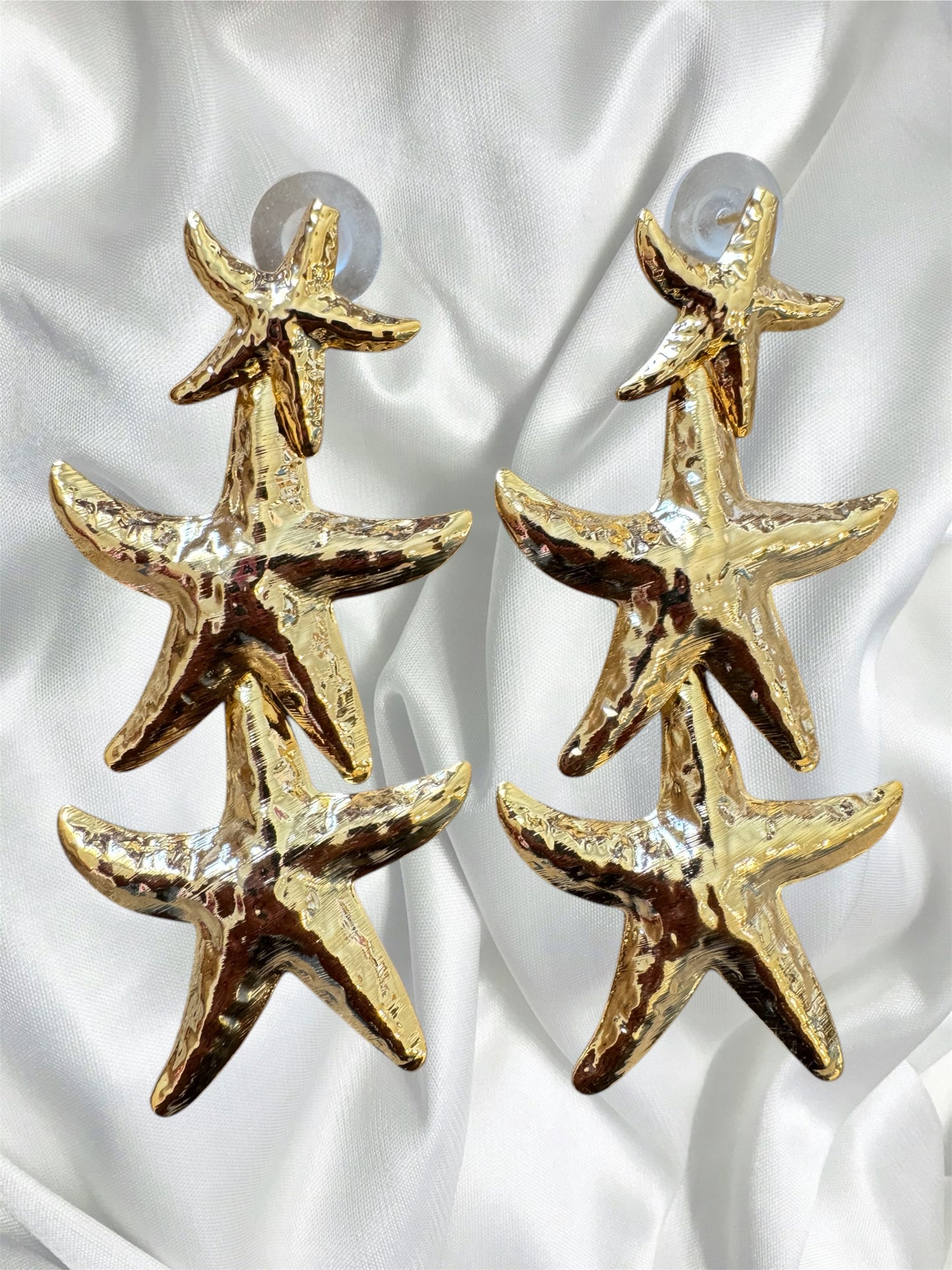 Siren’s gold earrings